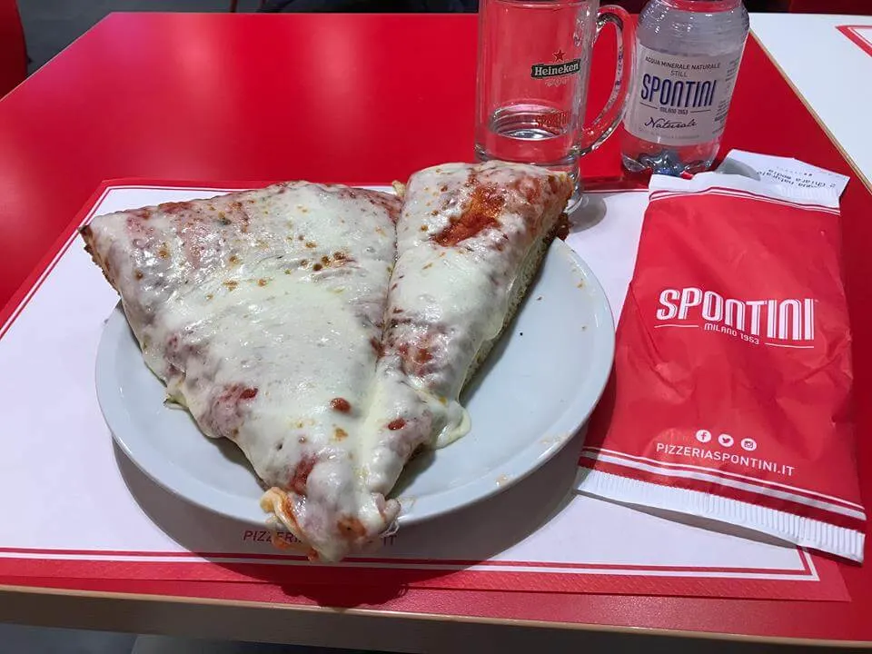 The awesome pizza of Spontini - a must on any Milan by night tour!
