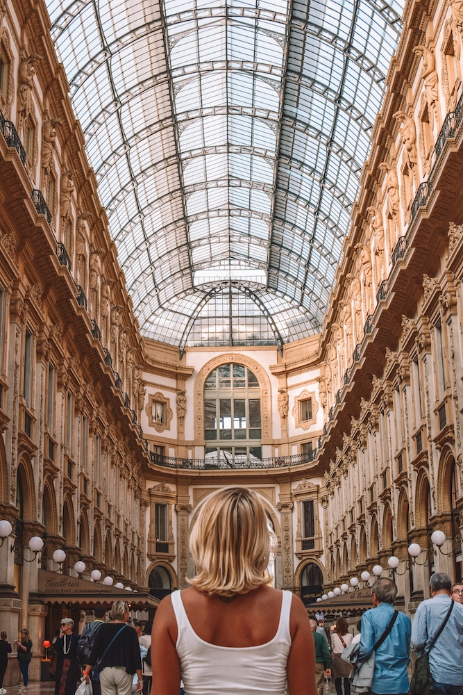 Admiring the perfect symmetry of Galleria Vittorio Emanuele in Milan, Italy