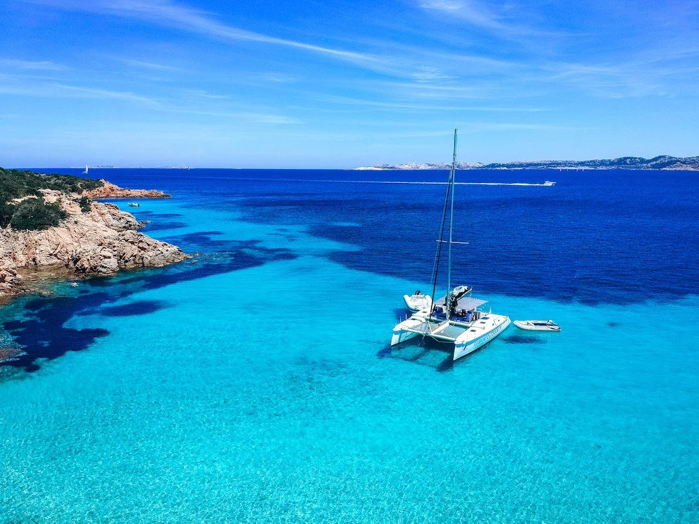 Sailing in Sardinia in JuneThe catamaran of Sport Outdoor Viaggi that we went sailing to Maddalena Archipelago with 