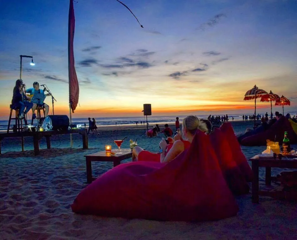 Dinner on the beach with a sunset view and live music