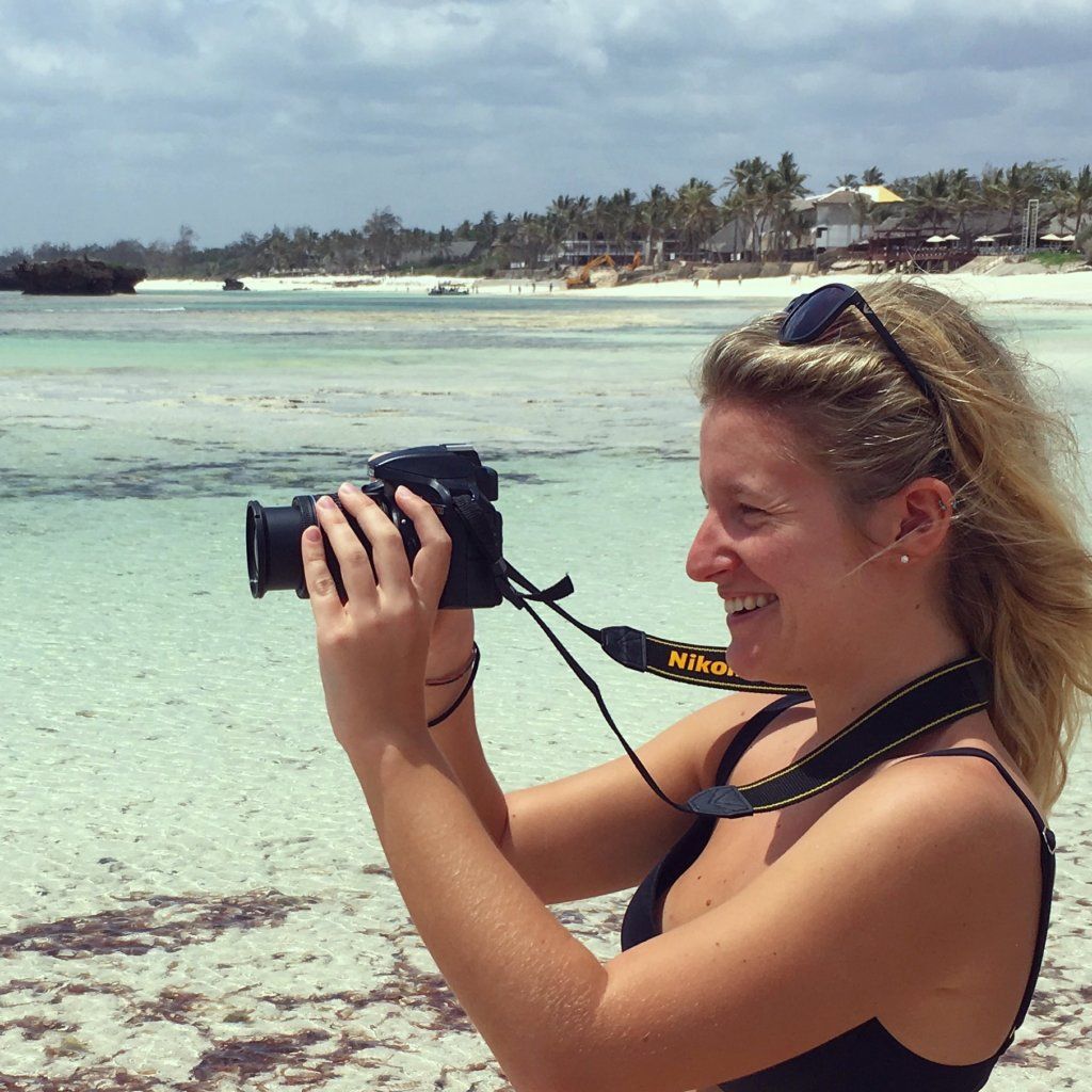 A travel vlogger in action, filming everything to share on my blog!