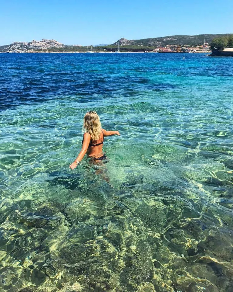 Swimming in the crystal clear waters of Sardinia