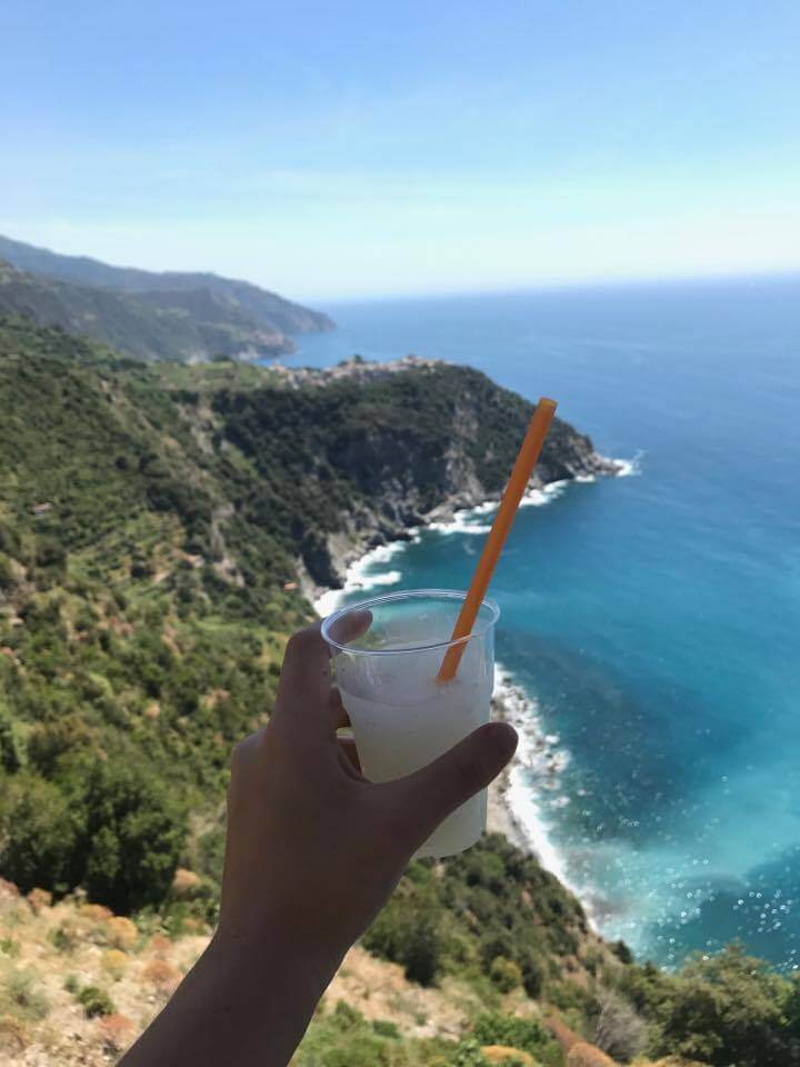 Enjoying a lemonade with views over Corniglia - a highlight of my last Cinque Terre day trip