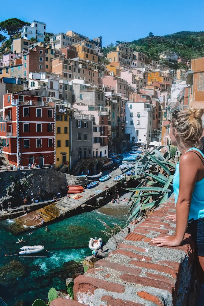 Admiring the colourful houses of Riomaggiore in Cinque Terre, Italy