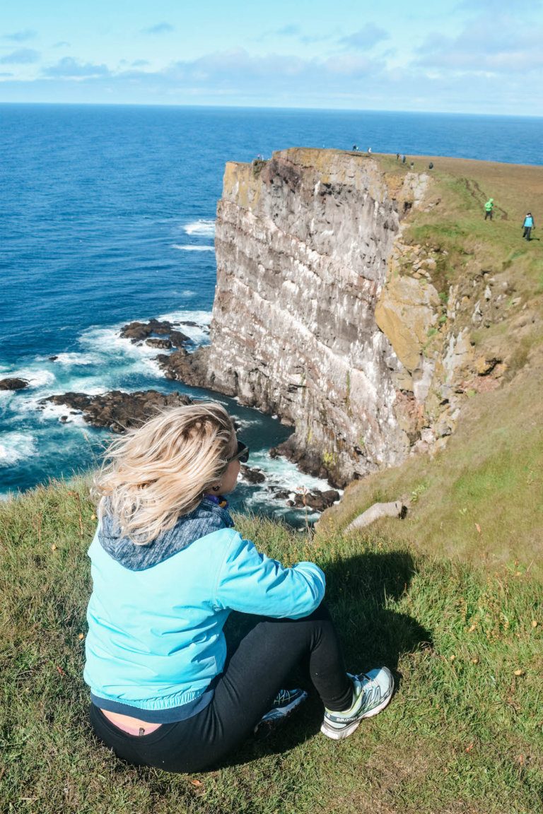 Admiring the huge cliffs of Látrabjarg, trying to spot some puffins