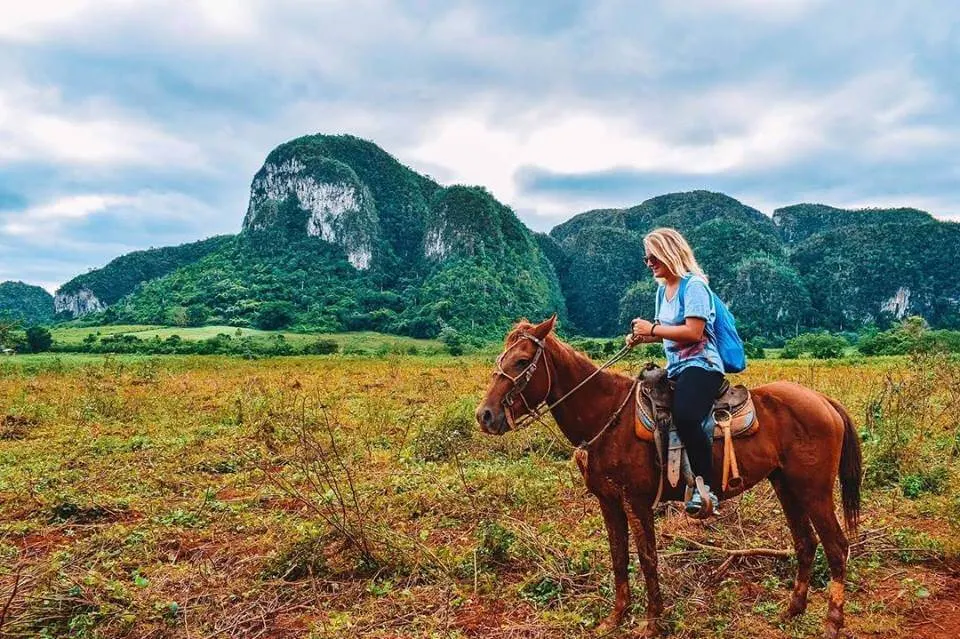 Me attempting to horse ride for the second time in my life in the valley of Viñales