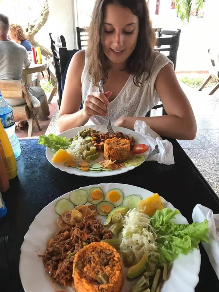 Enjoying a tasty Cuban lunch after a long day of horse riding in the valley of Viñales