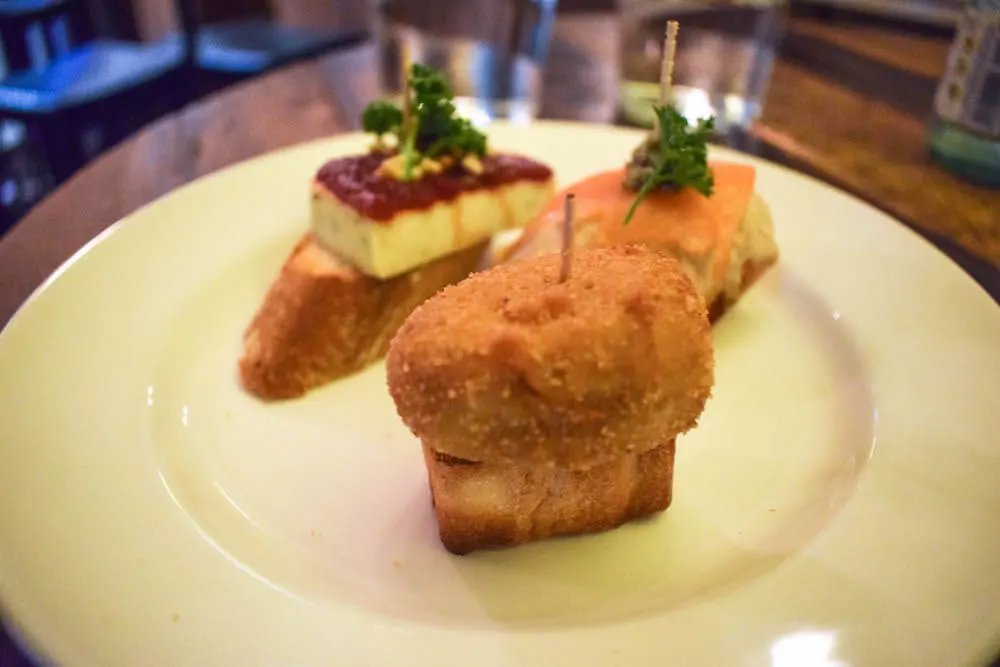 From left to right; A cheese and jam pincho, a chicken nugget pincho, and a smoked salmon and cheese pincho