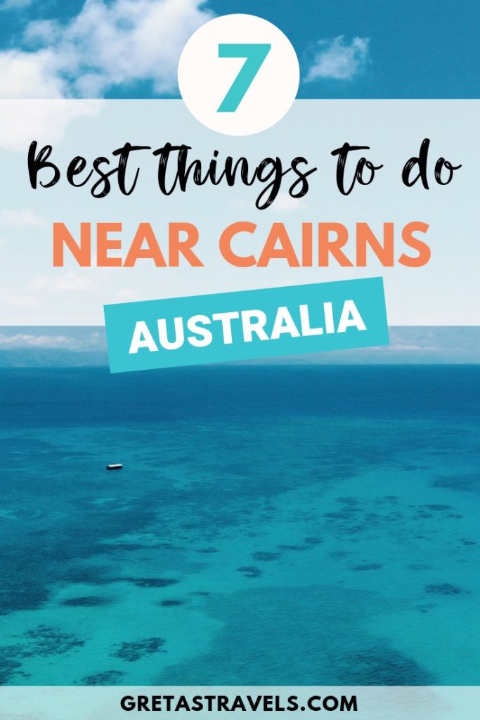 The Great Barrier Reef close to Cairns in Australia, with text overlay saying "7 best things to near Cairns, Australia"