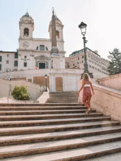 Wandering up the famous Spanish Steps towards Trinità dei Monti in Rome