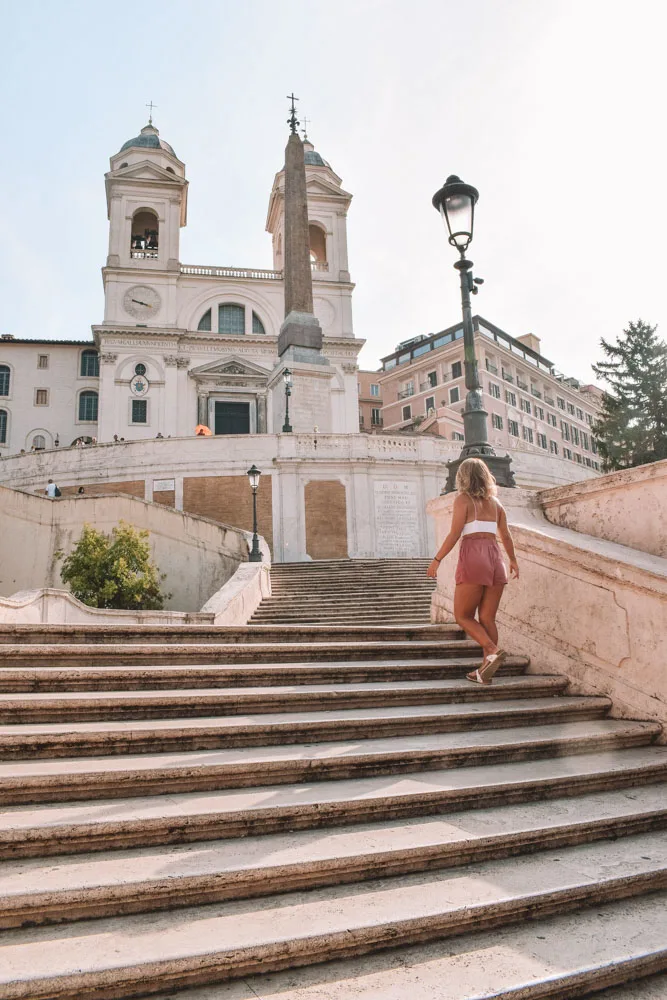 Wandering up the famous Spanish Steps towards Trinità dei Monti in Rome