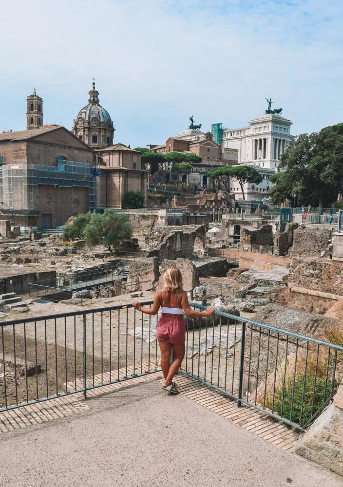 Admiring the view over the Fori Romani in Rome