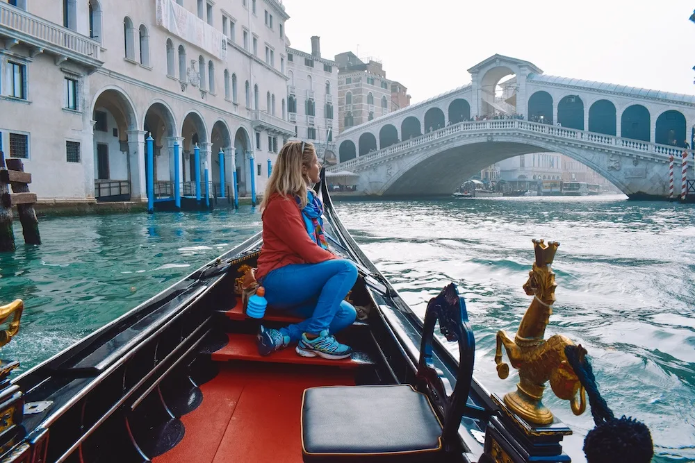 Our gondola ride in Venice took us close to Rialto Bridge