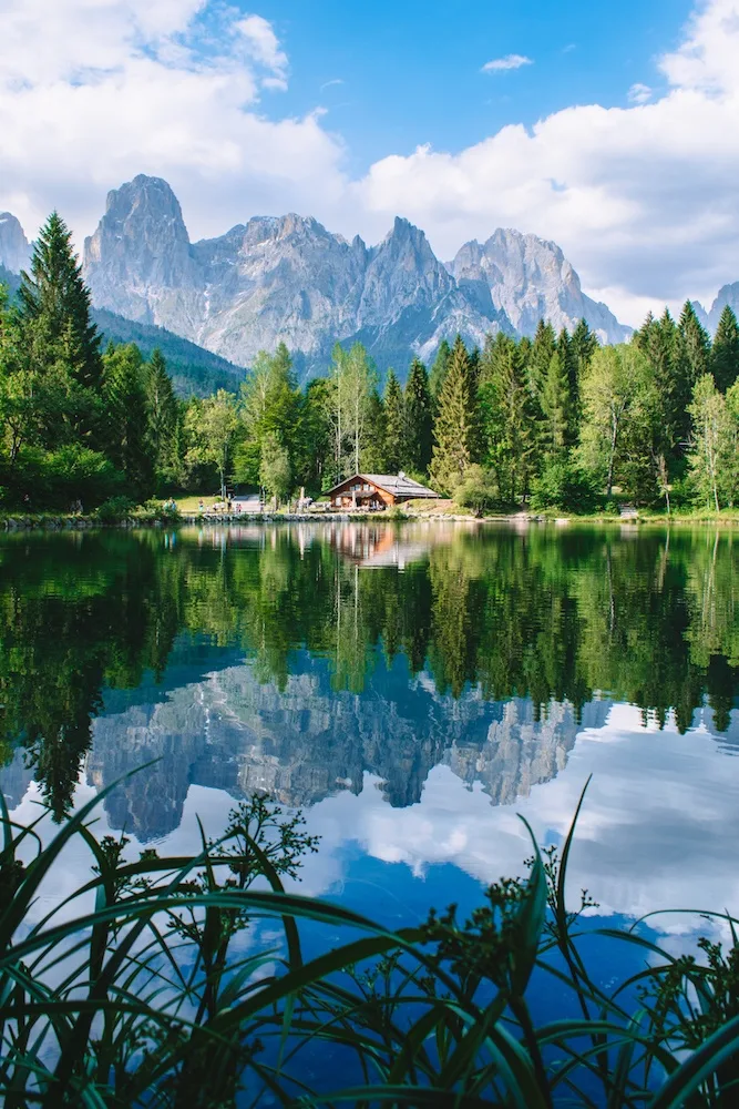 Beautiful reflections at Lake Welsperg in Trentino, Italy