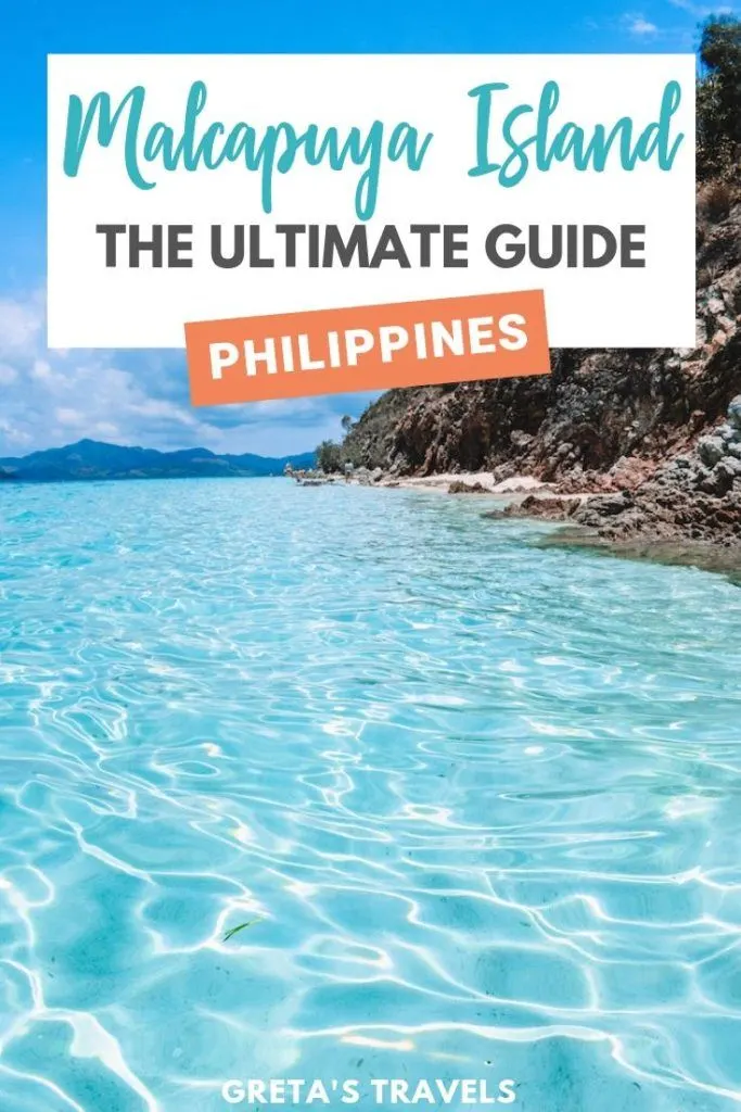 Photo of the beach with the clear turquoise water of Malcapuya Island with text overlay saying "Malcapuya Island: the ultimate guide, Philippines"