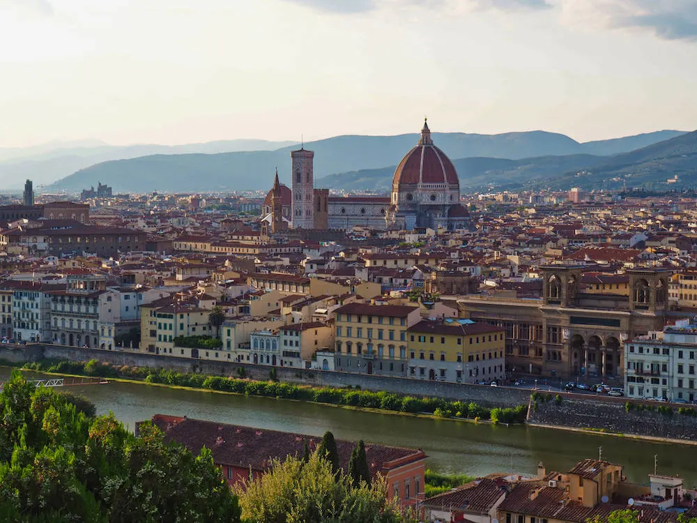 View over Florence from Piazza Michelangelo at golden hour - photo by Scopio