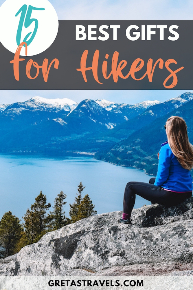 Blonde girl overlooking the mountains and lake from the top of the First Peak in Canada, with text overlay saying "15 best gifts for hikers"