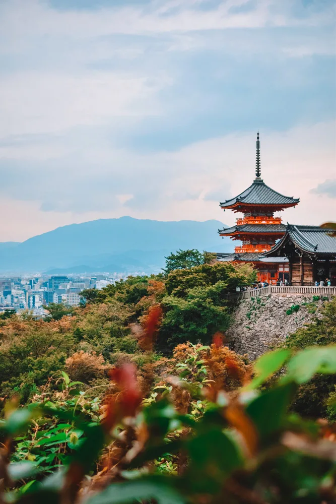 The view from Kiyomizudera temple over its main pagoda with Kyoto in the background