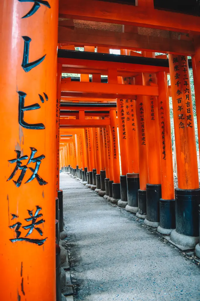 A quiet spot along the torii path of Fushimi Inari Taisha in Kyoto