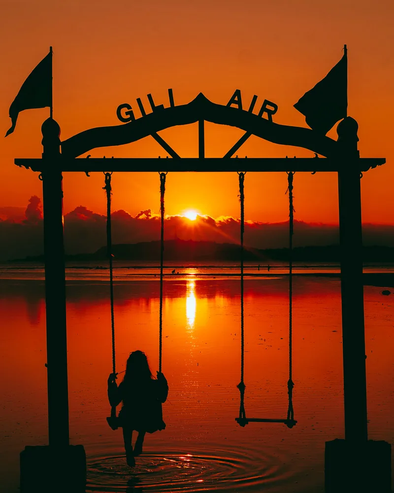 Enjoying the sunset from one of the swings in Gili Air