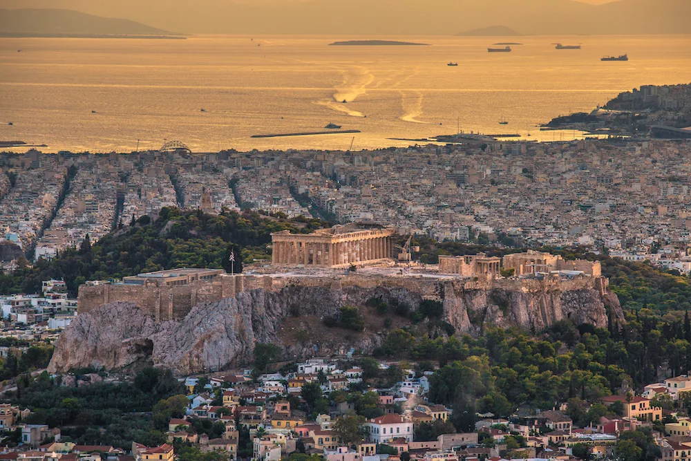 Aerial view of the Acropolis and Athens at sunset - Photo by Vagelis Pikoulas on Scopio
