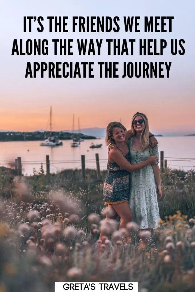 Photo of two girls hugging on the beach at sunset with text overlay saying "It's the friends we meet along the way that helps us appreciate the journey." - one of my favourite travel with friends quotes