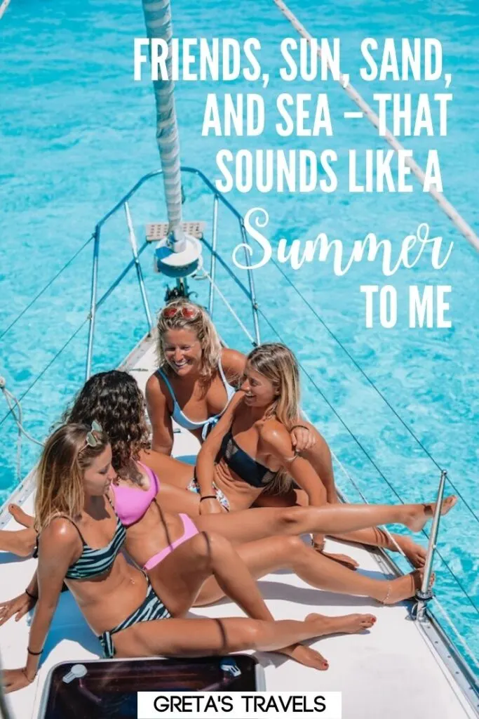 Photo of a group of girls in bikinis sat on a sailing boat with text overlay saying "saying "Friends, sun, sand and sea - that sounds like a summer to me."