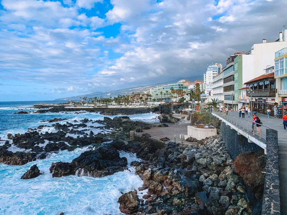Walking along the seafront of Puerto de la Cruz in Tenerife