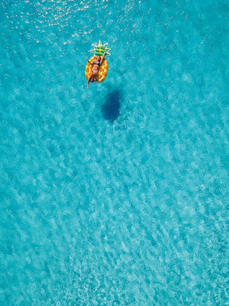 Floating away at the famous La Pelosa Beach in Stintino, Italy