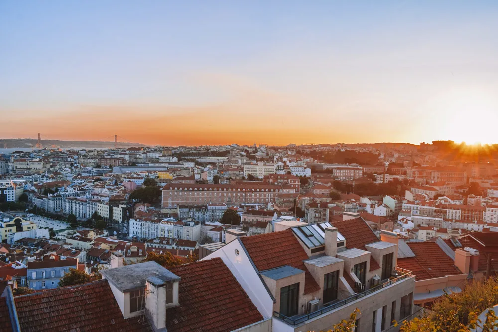The sunset from Miradouro da Senhora do Monte in Lisbon