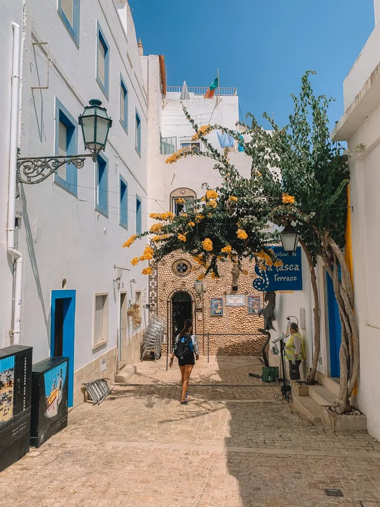 Exploring the streets of Albufeira Old Town - a great place to stay in Algarve for party goers