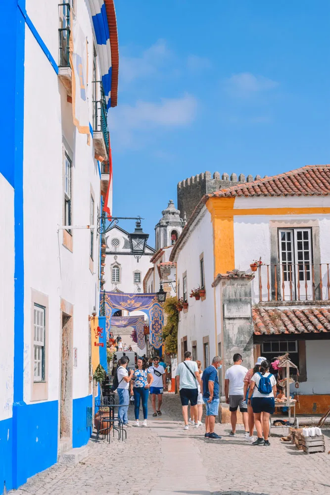 Wandering the cute streets of Obidos in Portugal