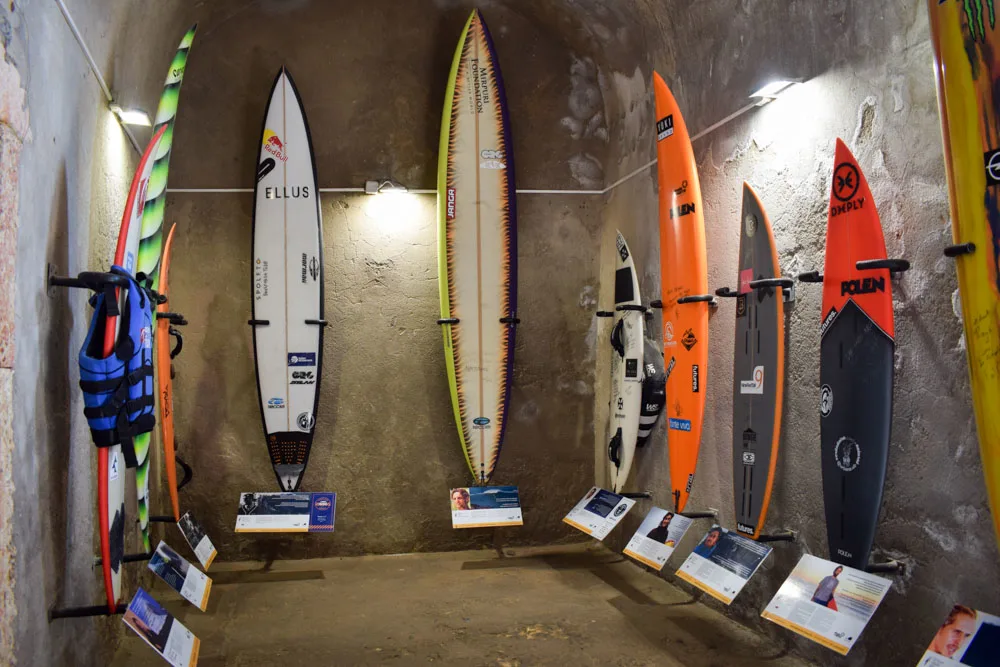 Some of the surf boards on display at the museum in the Faro de Nazare, Portugal
