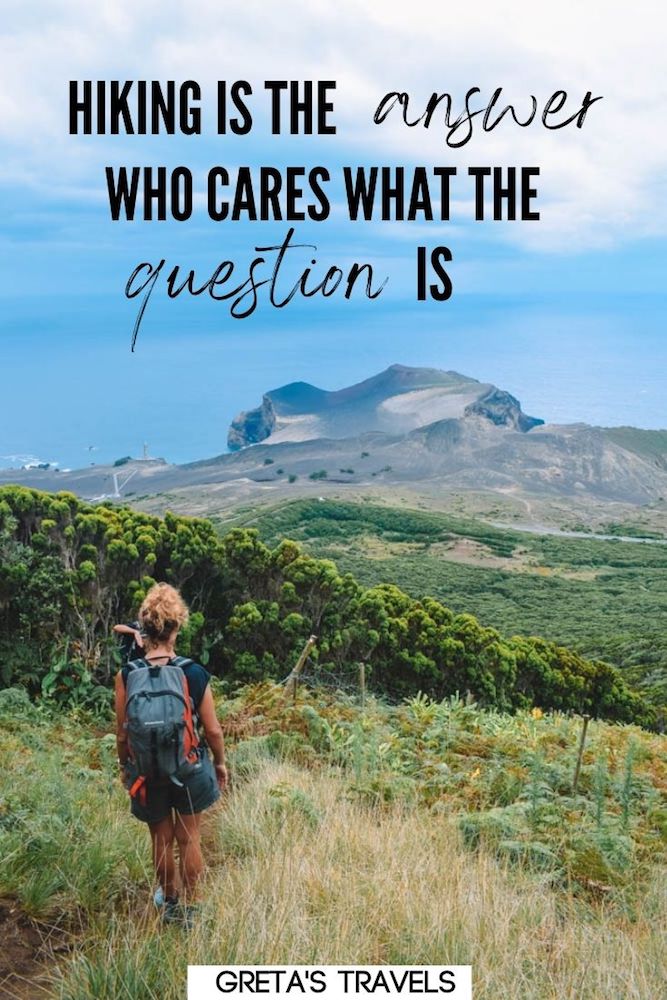 Photo of a blonde girl hiking the Calderon de Hondo trail in the Azores Islands, Portugal, with text overlay saying "hiking is the answer, who cares what the question is"