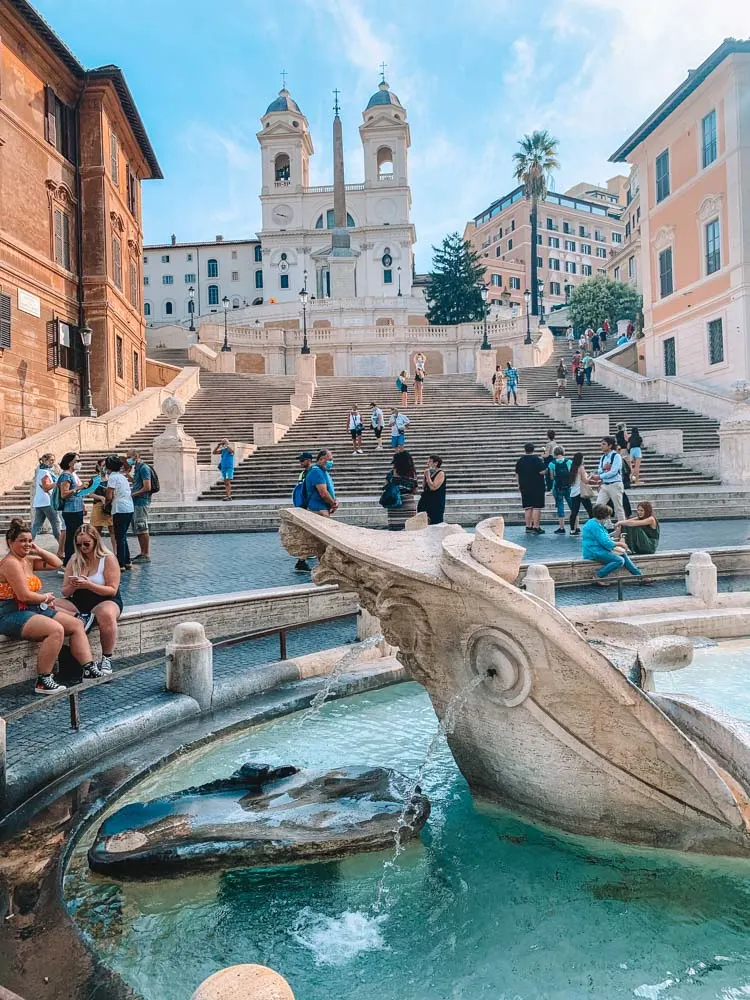 Fontana della Barcaccia and the Spanish Steps leading up to Trinità dei Monti in Rome