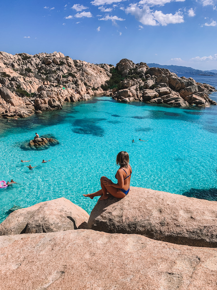Enjoying the view over the clear water of Cala Coticcio in Sardinia, Italy - a must-see for anyone travelling to Italy in summer