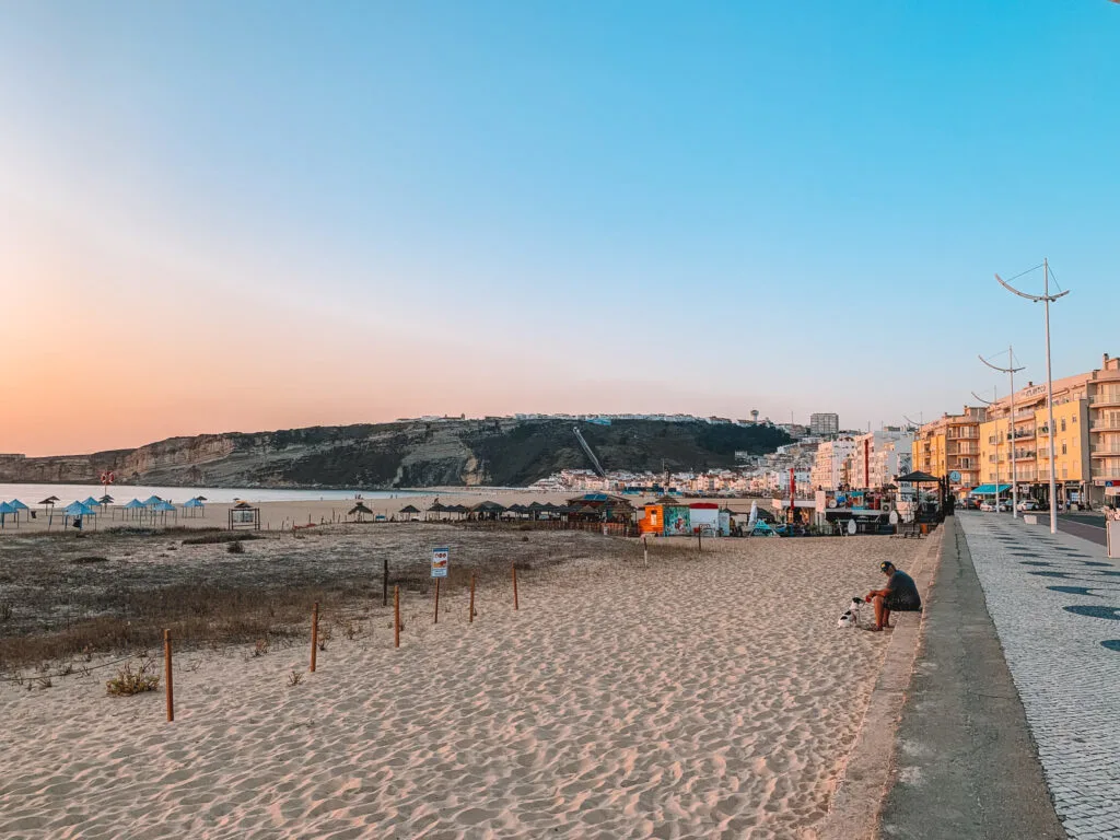 Walking along the seafront and Barrio dos Pescatores in Nazarè, Portugal