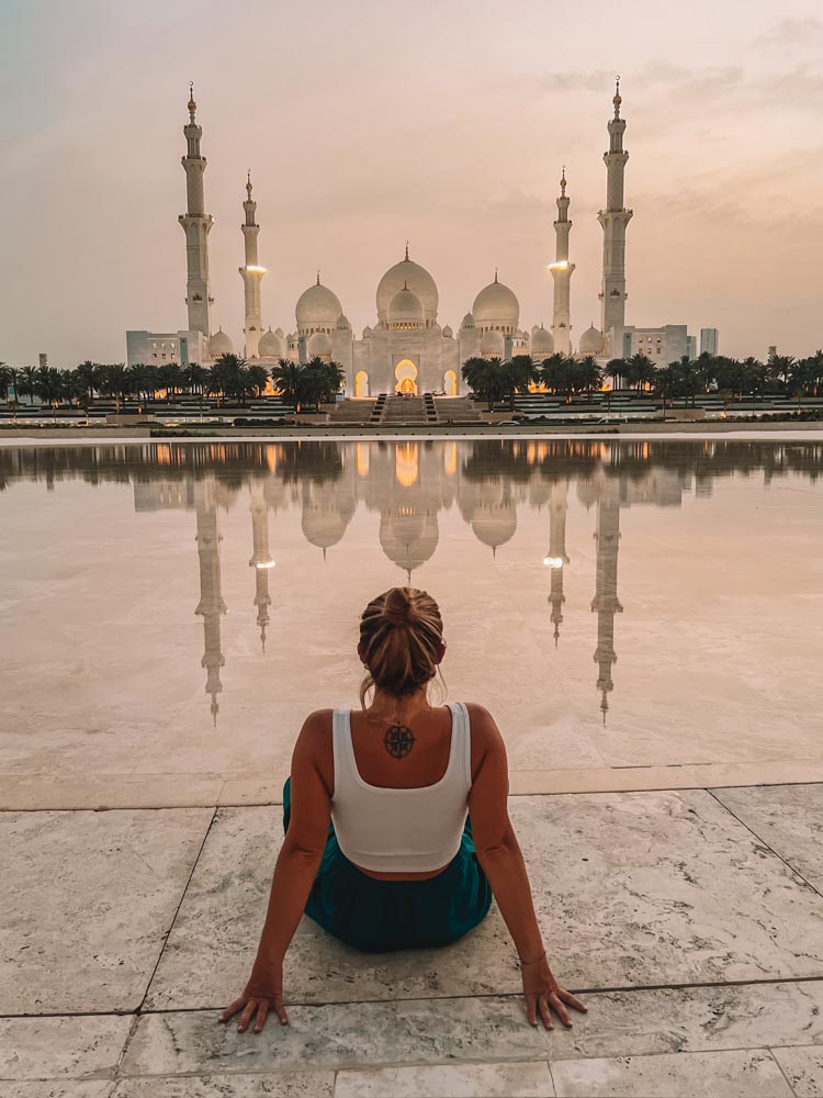 Enjoying the view over Sheikh Zayed Grand Mosque at sunset - the highlight of my Dubai to Abu Dhabi day trip