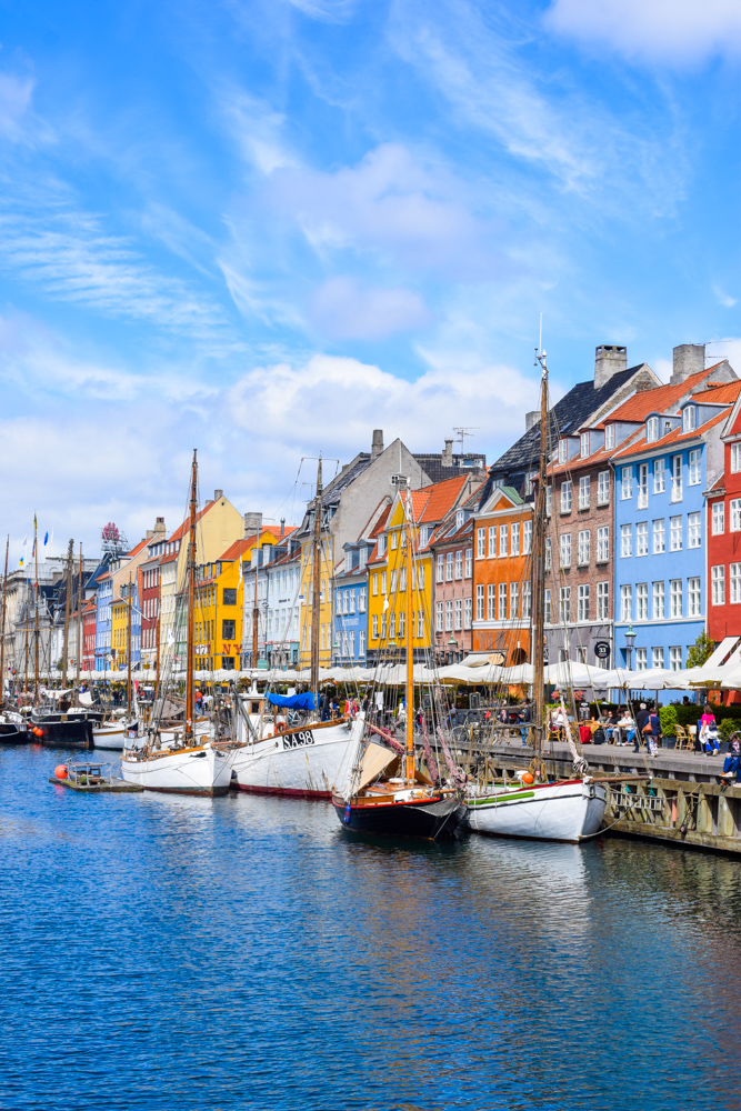 The iconic coloured houses and canal boats of Nyhavn, Copenhagen