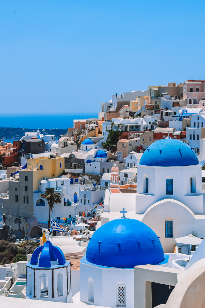 The iconic blue roofs and views of Oia in Santorini, Greece