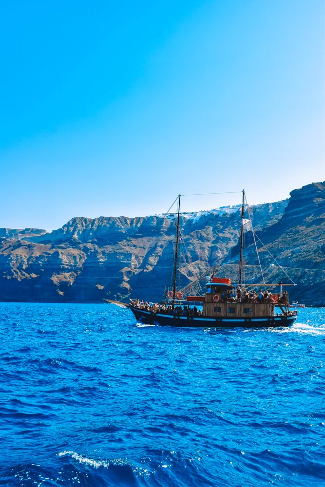 The wooden boat we did our Santorini caldera cruise with