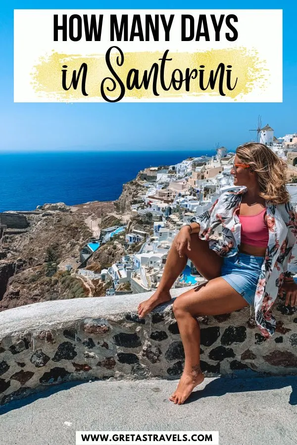 Photo of a blonde girl in a pink top and jeans standing in front of the iconic Oia view in Santorini with text overlay saying "How many days in Santorini"