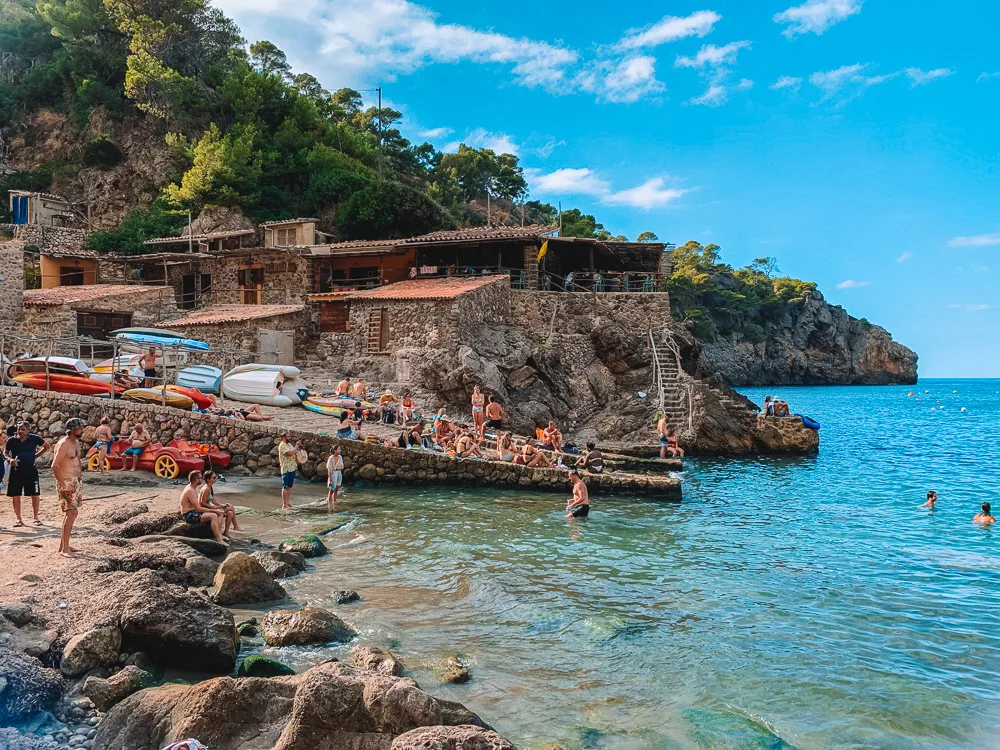 The picturesque houses and restaurants of Cala Deia in Mallorca, Spain