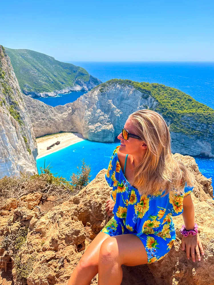 Enjoying the view over the iconic Navagio Shipwreck Beach in Zakynthos, Greece
