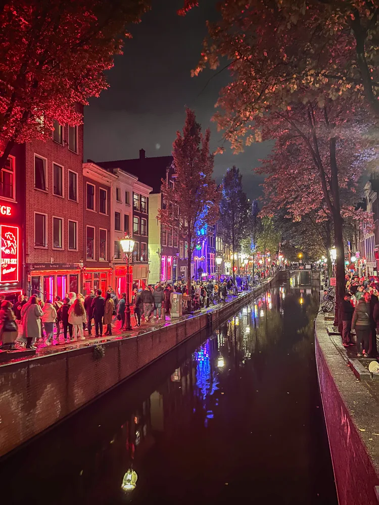 Exploring the Red Light District in Amsterdam in the evening