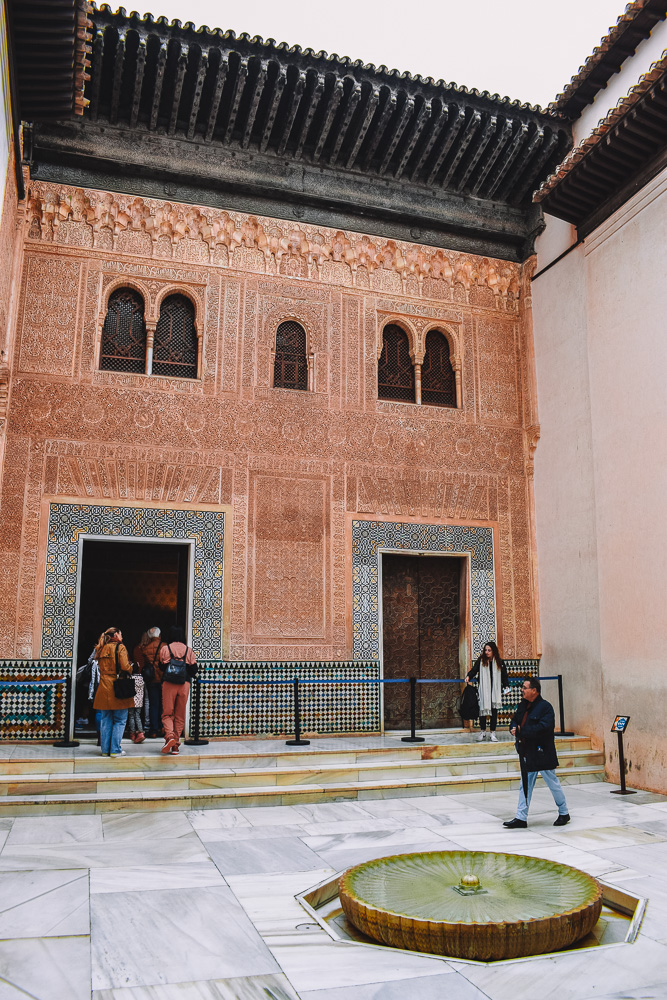 Exploring the beautiful inner courtyards of the Alhambra in Spain