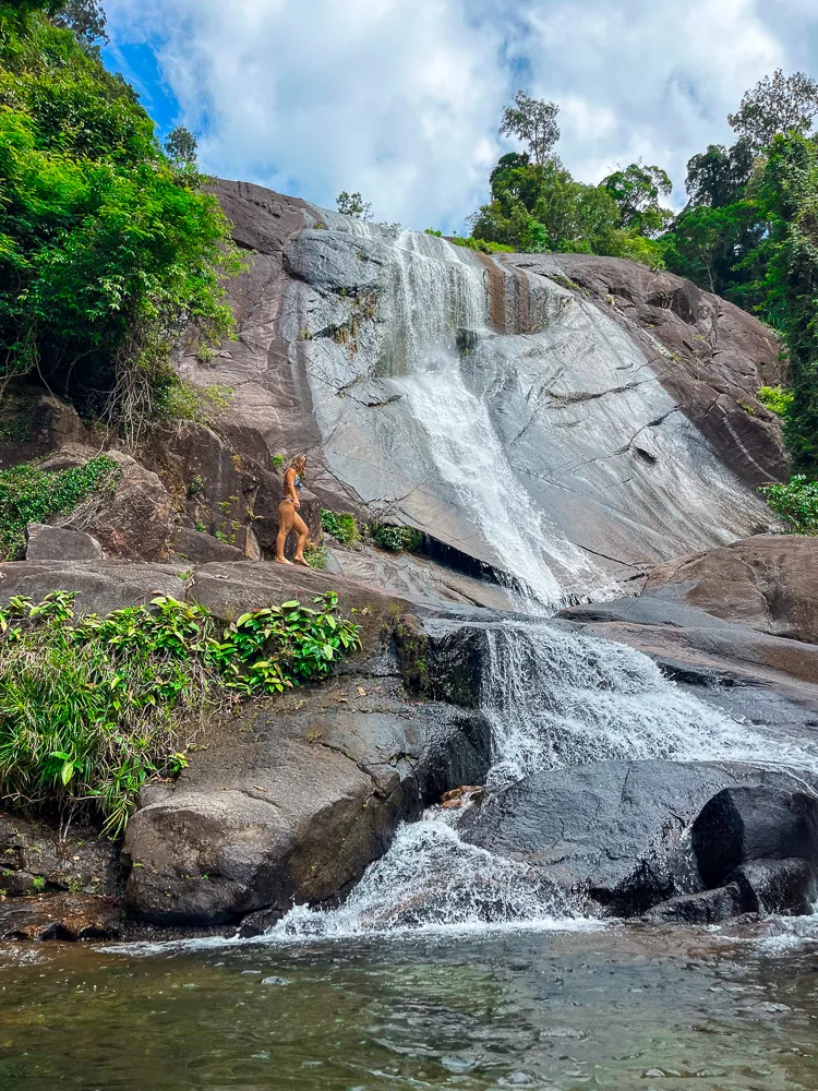 Enjoying a refreshing swim in Telaga Tujuh Waterfall in Langkawi, Malaysia