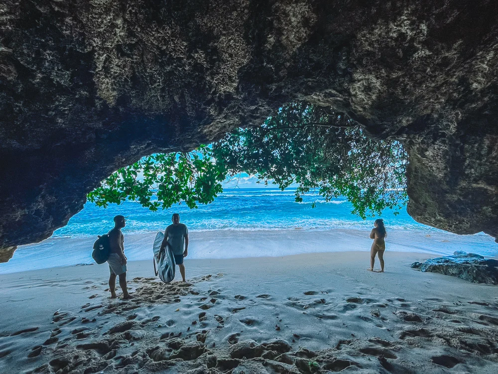 Chilling in the shade of the cave on Green Bowl Beach in Bali