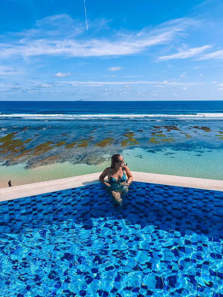 Enjoying the view from the infinity pool of White Rock at Melasti Beach, Bali