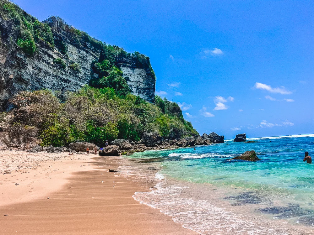 The bigger beach at Suluban Beach in Uluwatu, just past the cave